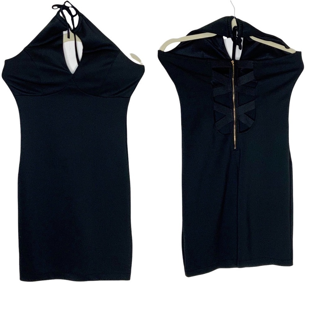Black mini halter dress. Back cris cross. Sexy